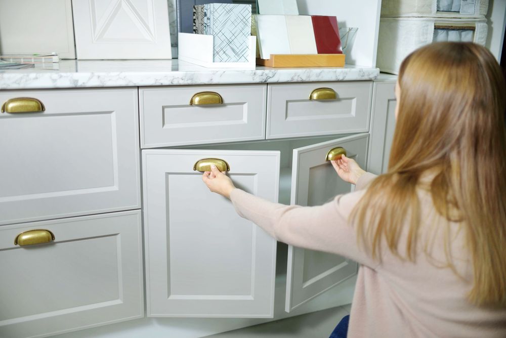 Woman Opening Cabinets Woman Opening Cabinets