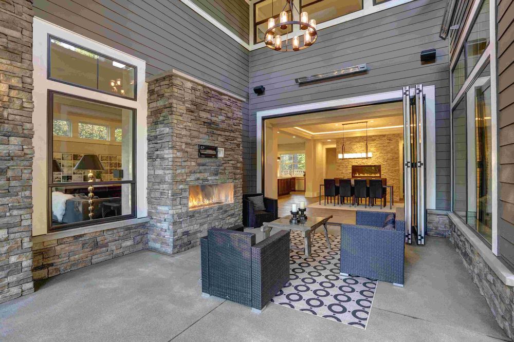 upscale patio with combo of vinyl siding & stone veneer on home exterior upscale patio with combo of vinyl siding & stone veneer on home exterior