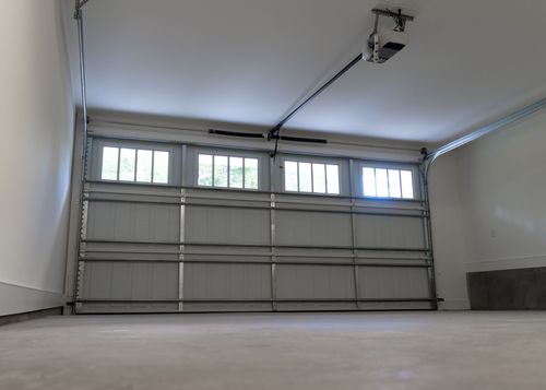Garage Door Opener Shopping: 11 Tips For Homeowners Interior of Residential Two-Car Garage