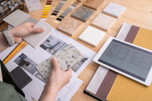 Top 5 Interior Design Trends for 2024 Designer Comparing Countertop Samples