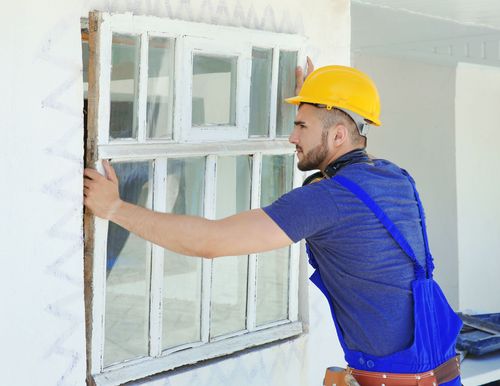 Single-Hung Vs. Double-Hung: Which Windows Are Right For Your Home? Contractor Removing Window From Frame.